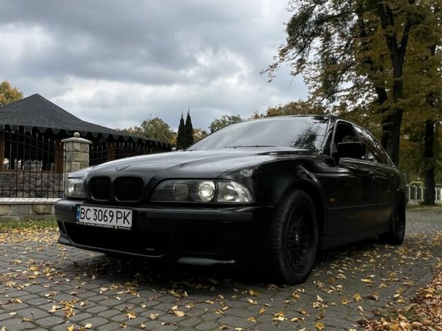 Черный БМВ 5 Серия, объемом двигателя 2.5 л и пробегом 299 тыс. км за 2999 $, фото 1 на Automoto.ua