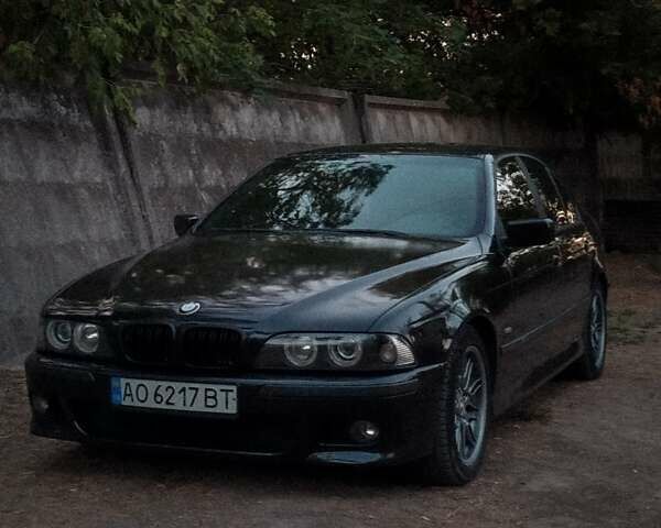 Черный БМВ 5 Серия, объемом двигателя 4.4 л и пробегом 470 тыс. км за 5800 $, фото 1 на Automoto.ua