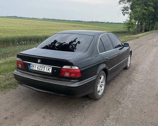 Черный БМВ 5 Серия, объемом двигателя 1.99 л и пробегом 435 тыс. км за 4300 $, фото 1 на Automoto.ua