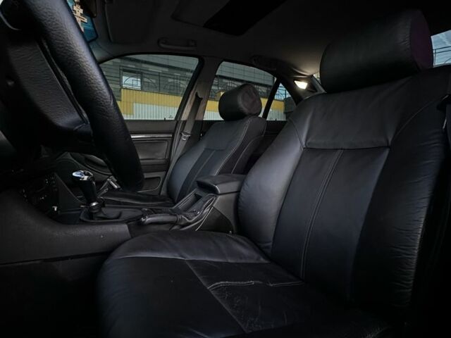 Черный БМВ 5 Серия, объемом двигателя 2 л и пробегом 250 тыс. км за 3499 $, фото 5 на Automoto.ua