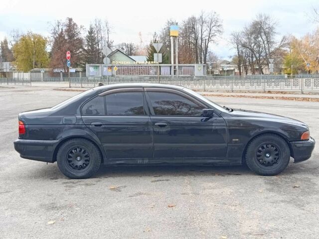 Черный БМВ 5 Серия, объемом двигателя 2.5 л и пробегом 320 тыс. км за 1850 $, фото 4 на Automoto.ua