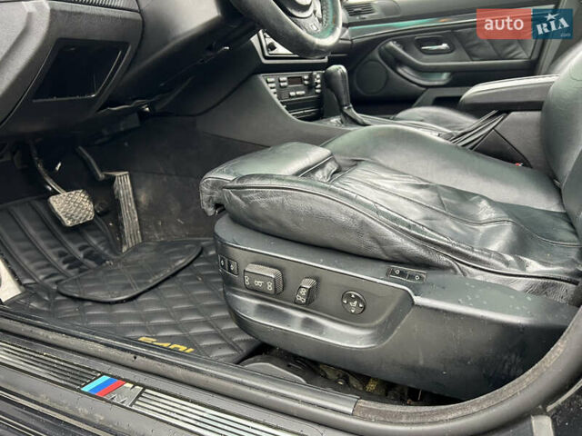Черный БМВ 5 Серия, объемом двигателя 4.4 л и пробегом 999 тыс. км за 8000 $, фото 5 на Automoto.ua