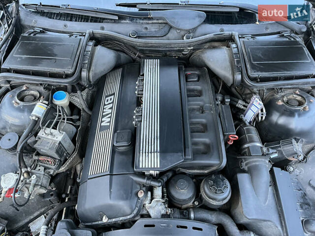 Черный БМВ 5 Серия, объемом двигателя 2.5 л и пробегом 470 тыс. км за 4100 $, фото 7 на Automoto.ua