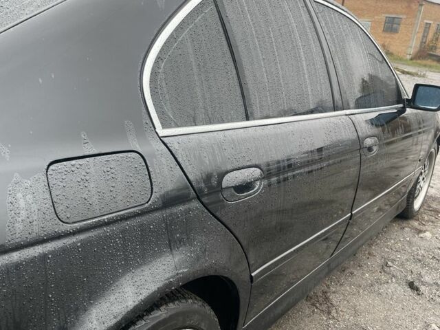 Черный БМВ 5 Серия, объемом двигателя 2.9 л и пробегом 3 тыс. км за 4750 $, фото 2 на Automoto.ua