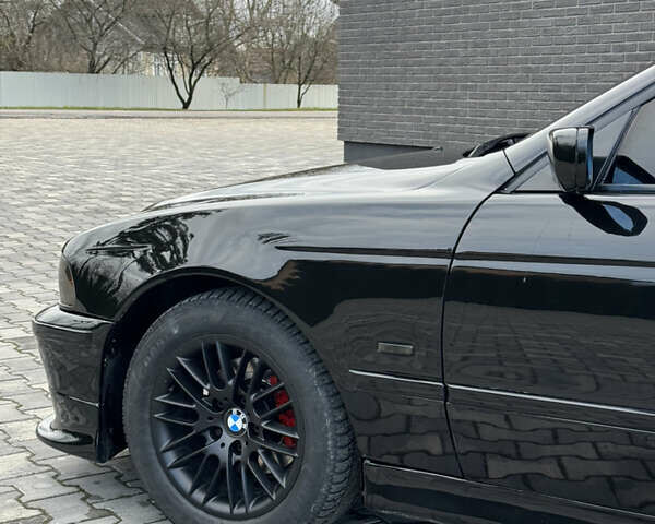 Черный БМВ 5 Серия, объемом двигателя 2.5 л и пробегом 350 тыс. км за 5555 $, фото 12 на Automoto.ua