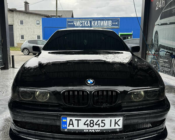 Черный БМВ 5 Серия, объемом двигателя 2.5 л и пробегом 350 тыс. км за 5555 $, фото 1 на Automoto.ua