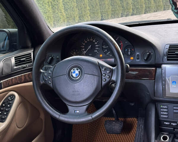 Черный БМВ 5 Серия, объемом двигателя 2.5 л и пробегом 350 тыс. км за 5555 $, фото 42 на Automoto.ua