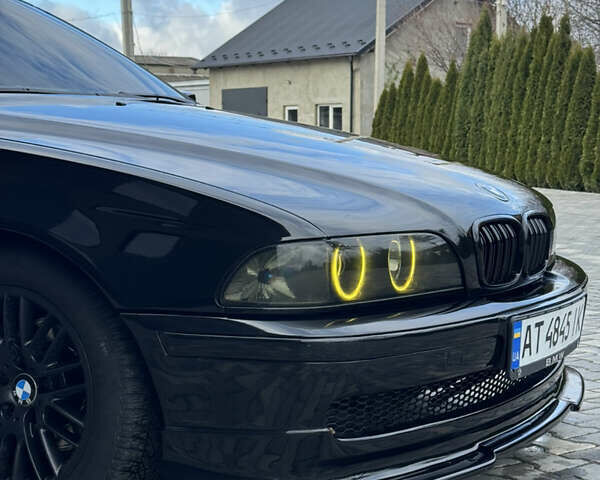 Черный БМВ 5 Серия, объемом двигателя 2.5 л и пробегом 350 тыс. км за 5555 $, фото 25 на Automoto.ua