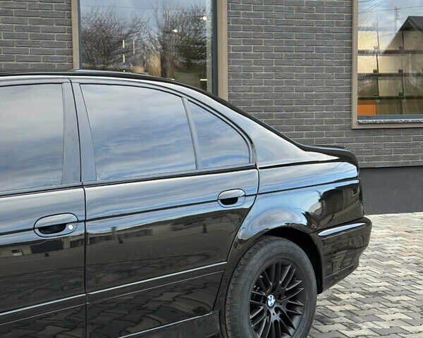 Черный БМВ 5 Серия, объемом двигателя 2.5 л и пробегом 350 тыс. км за 5555 $, фото 11 на Automoto.ua