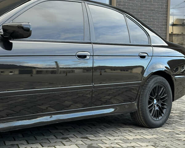 Черный БМВ 5 Серия, объемом двигателя 2.5 л и пробегом 350 тыс. км за 5555 $, фото 10 на Automoto.ua