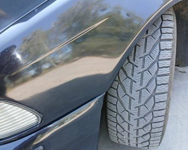 Черный БМВ 5 Серия, объемом двигателя 2.98 л и пробегом 360 тыс. км за 4800 $, фото 2 на Automoto.ua