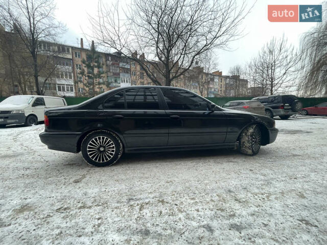 Черный БМВ 5 Серия, объемом двигателя 3 л и пробегом 477 тыс. км за 5600 $, фото 1 на Automoto.ua