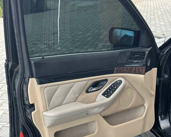 Черный БМВ 5 Серия, объемом двигателя 2.5 л и пробегом 350 тыс. км за 5555 $, фото 29 на Automoto.ua