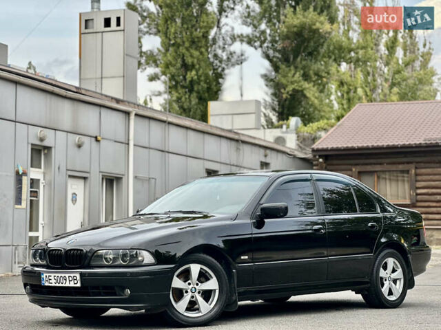 Черный БМВ 5 Серия, объемом двигателя 2.5 л и пробегом 398 тыс. км за 5000 $, фото 4 на Automoto.ua