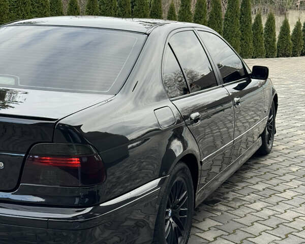 Черный БМВ 5 Серия, объемом двигателя 2.5 л и пробегом 350 тыс. км за 5555 $, фото 19 на Automoto.ua