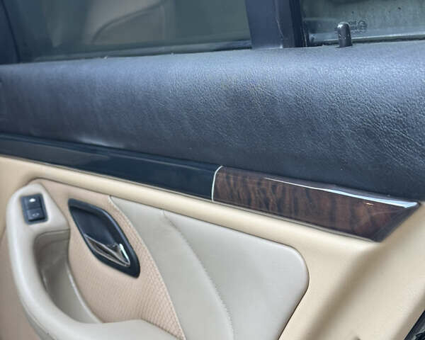 Черный БМВ 5 Серия, объемом двигателя 2.5 л и пробегом 350 тыс. км за 5555 $, фото 39 на Automoto.ua