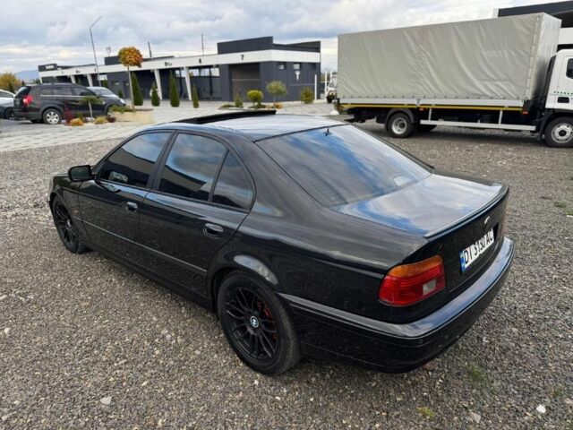 Черный БМВ 5 Серия, объемом двигателя 3 л и пробегом 400 тыс. км за 3000 $, фото 1 на Automoto.ua