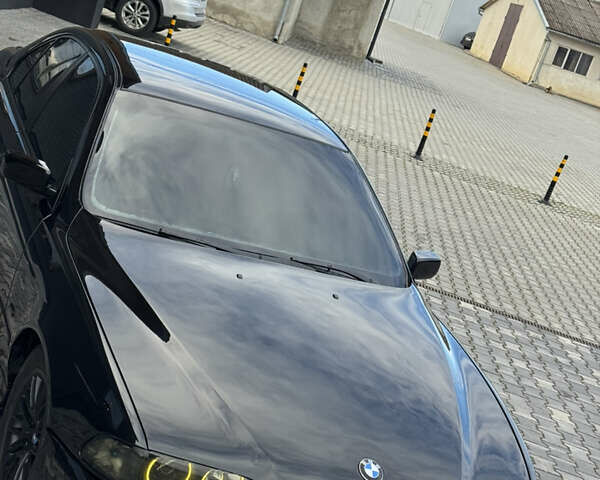 Черный БМВ 5 Серия, объемом двигателя 2.5 л и пробегом 350 тыс. км за 5555 $, фото 26 на Automoto.ua