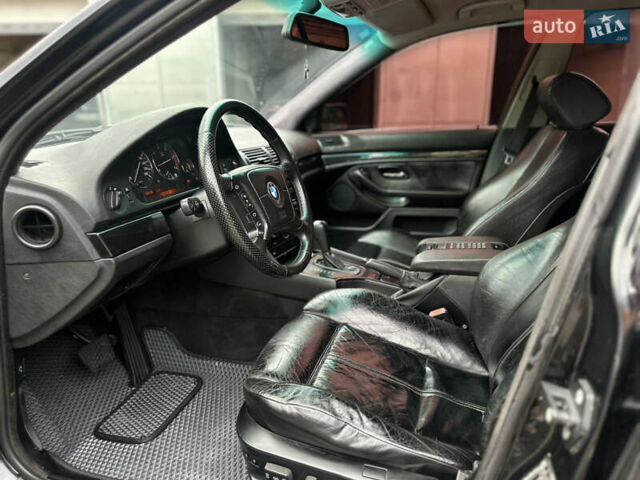 Черный БМВ 5 Серия, объемом двигателя 2.5 л и пробегом 398 тыс. км за 5000 $, фото 21 на Automoto.ua