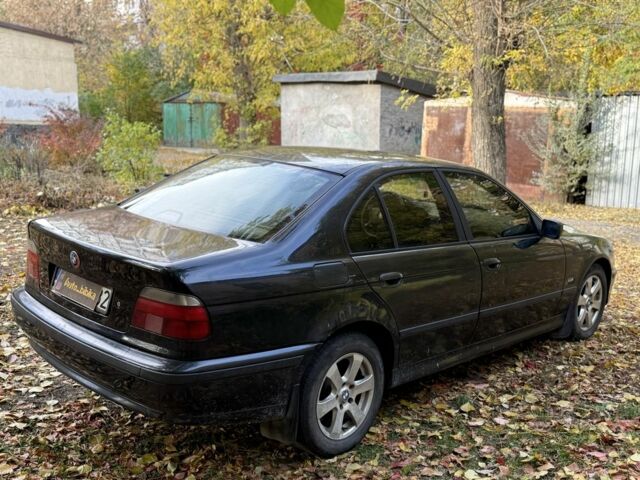 Черный БМВ 5 Серия, объемом двигателя 2.5 л и пробегом 300 тыс. км за 2199 $, фото 1 на Automoto.ua