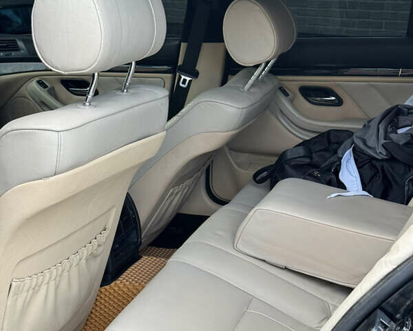 Черный БМВ 5 Серия, объемом двигателя 2.5 л и пробегом 350 тыс. км за 5555 $, фото 34 на Automoto.ua