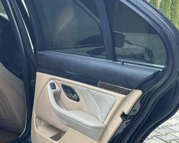 Черный БМВ 5 Серия, объемом двигателя 2.5 л и пробегом 350 тыс. км за 5555 $, фото 36 на Automoto.ua