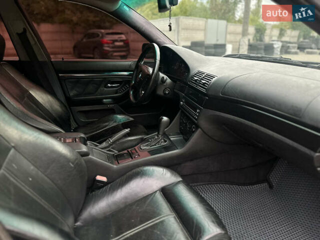 Черный БМВ 5 Серия, объемом двигателя 2.5 л и пробегом 398 тыс. км за 5000 $, фото 29 на Automoto.ua