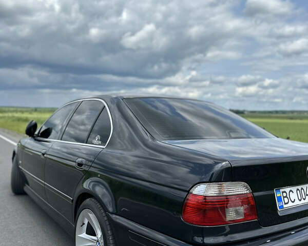 Черный БМВ 5 Серия, объемом двигателя 2.5 л и пробегом 468 тыс. км за 8999 $, фото 9 на Automoto.ua