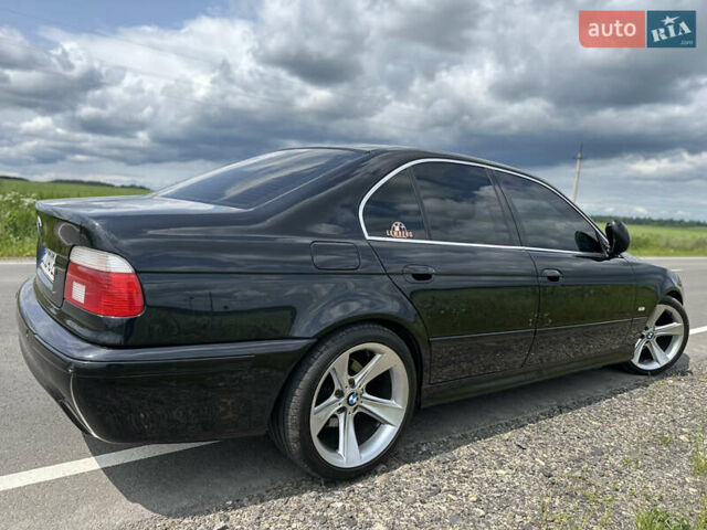 Черный БМВ 5 Серия, объемом двигателя 2.5 л и пробегом 468 тыс. км за 8999 $, фото 11 на Automoto.ua