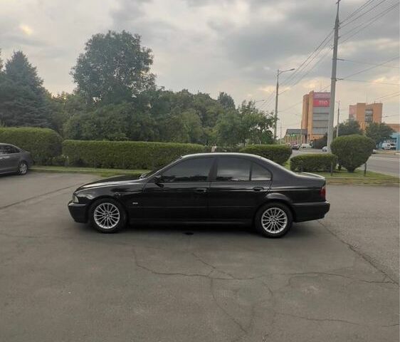 Черный БМВ 5 Серия, объемом двигателя 2.5 л и пробегом 434 тыс. км за 5900 $, фото 6 на Automoto.ua