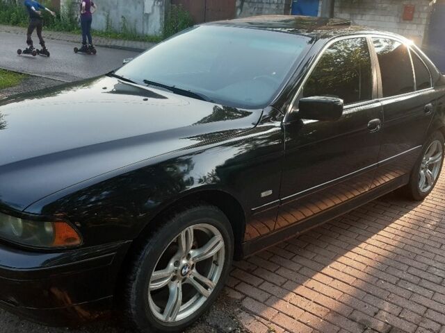 Черный БМВ 5 Серия, объемом двигателя 2.5 л и пробегом 298 тыс. км за 3560 $, фото 1 на Automoto.ua