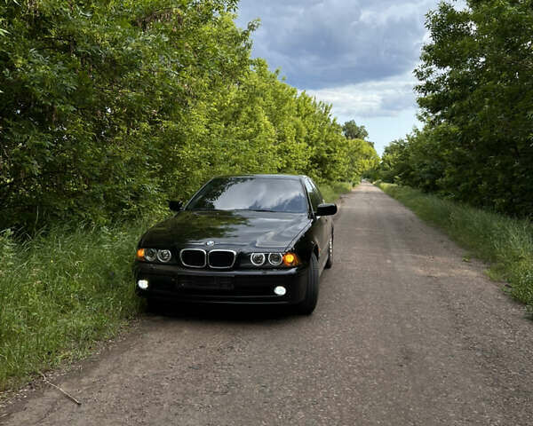 Черный БМВ 5 Серия, объемом двигателя 3 л и пробегом 340 тыс. км за 7400 $, фото 3 на Automoto.ua