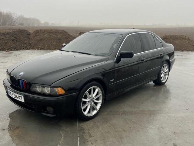 Черный БМВ 5 Серия, объемом двигателя 2.5 л и пробегом 350 тыс. км за 5450 $, фото 1 на Automoto.ua