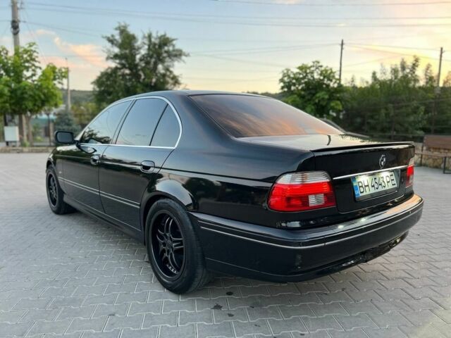 Черный БМВ 5 Серия, объемом двигателя 2.5 л и пробегом 317 тыс. км за 5100 $, фото 4 на Automoto.ua