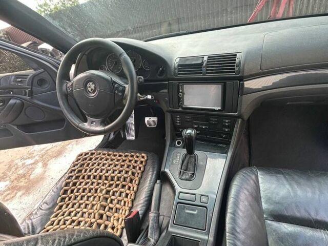 Черный БМВ 5 Серия, объемом двигателя 2.5 л и пробегом 500 тыс. км за 5700 $, фото 6 на Automoto.ua