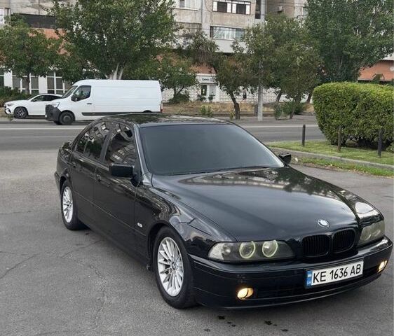 Черный БМВ 5 Серия, объемом двигателя 2.5 л и пробегом 434 тыс. км за 5900 $, фото 1 на Automoto.ua