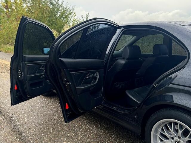 Черный БМВ 5 Серия, объемом двигателя 2.5 л и пробегом 324 тыс. км за 6000 $, фото 5 на Automoto.ua