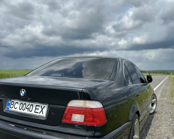 Черный БМВ 5 Серия, объемом двигателя 2.5 л и пробегом 468 тыс. км за 8999 $, фото 10 на Automoto.ua