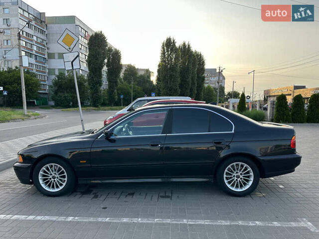 Черный БМВ 5 Серия, объемом двигателя 2.5 л и пробегом 300 тыс. км за 5700 $, фото 1 на Automoto.ua
