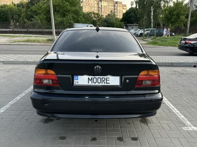 Черный БМВ 5 Серия, объемом двигателя 2.5 л и пробегом 300 тыс. км за 5700 $, фото 1 на Automoto.ua