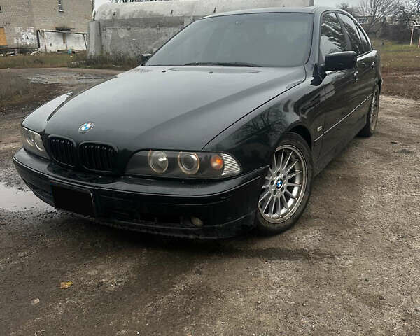 Черный БМВ 5 Серия, объемом двигателя 3 л и пробегом 446 тыс. км за 6500 $, фото 1 на Automoto.ua