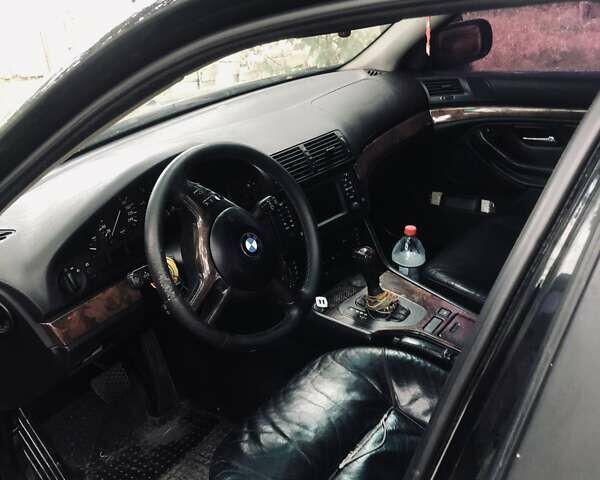 Черный БМВ 5 Серия, объемом двигателя 3 л и пробегом 500 тыс. км за 6000 $, фото 5 на Automoto.ua