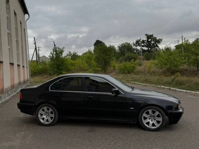 Черный БМВ 5 Серия, объемом двигателя 2.5 л и пробегом 395 тыс. км за 4999 $, фото 4 на Automoto.ua