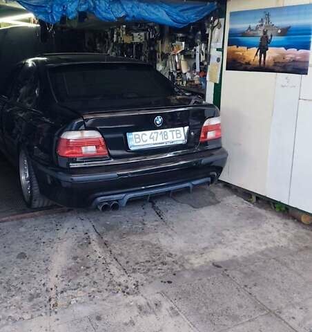 Черный БМВ 5 Серия, объемом двигателя 4.4 л и пробегом 650 тыс. км за 7000 $, фото 2 на Automoto.ua