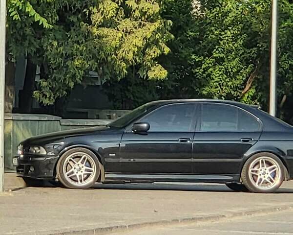 Черный БМВ 5 Серия, объемом двигателя 4.4 л и пробегом 650 тыс. км за 7000 $, фото 4 на Automoto.ua
