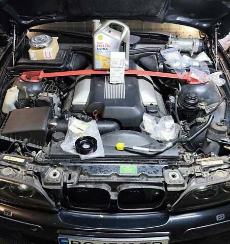 Черный БМВ 5 Серия, объемом двигателя 4.4 л и пробегом 650 тыс. км за 7000 $, фото 9 на Automoto.ua