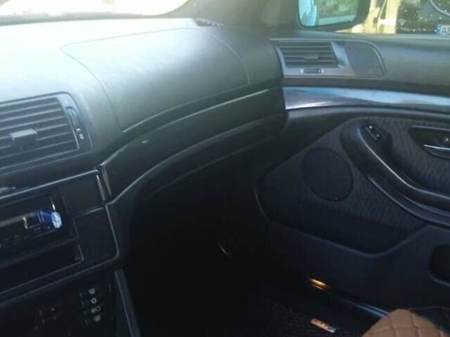 Черный БМВ 5 Серия, объемом двигателя 1.95 л и пробегом 699 тыс. км за 4800 $, фото 2 на Automoto.ua