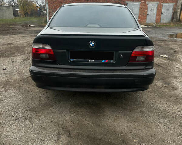 Черный БМВ 5 Серия, объемом двигателя 3 л и пробегом 446 тыс. км за 6500 $, фото 5 на Automoto.ua