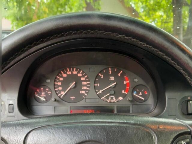 Черный БМВ 5 Серия, объемом двигателя 2.5 л и пробегом 395 тыс. км за 4999 $, фото 7 на Automoto.ua