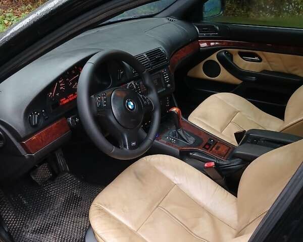 Черный БМВ 5 Серия, объемом двигателя 2.5 л и пробегом 349 тыс. км за 5900 $, фото 7 на Automoto.ua